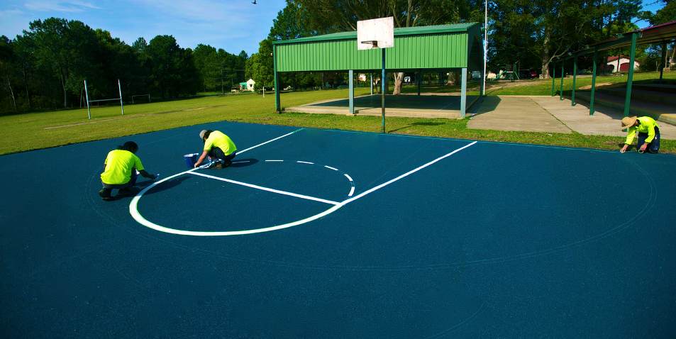 Basketball court resurfacing with wet pour rubber